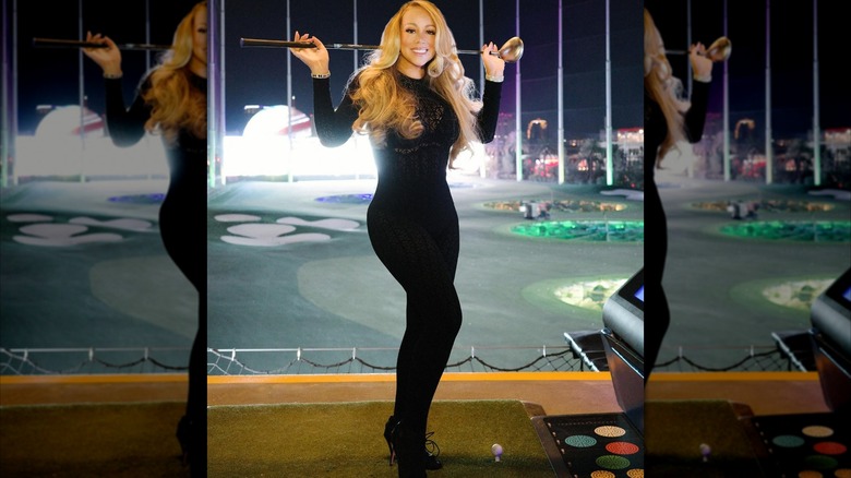 Mariah Carey jugando al golf
