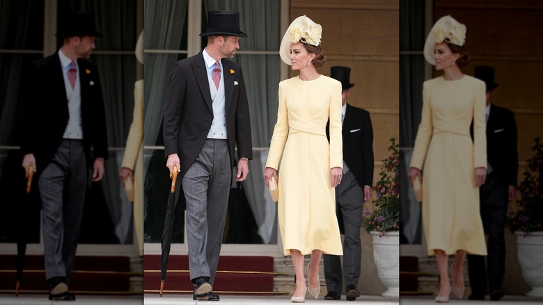 El príncipe William y Kate Middleton en las escaleras del Palacio de Buckingham