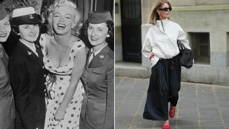 Marilyn Monroe posa con miembros del servicio y una mujer de moda en la calle de Munich.