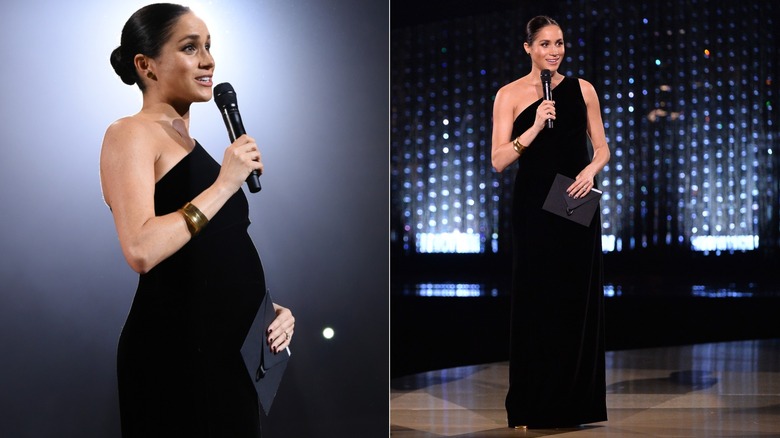 Meghan Markle con un vestido negro de un solo hombro