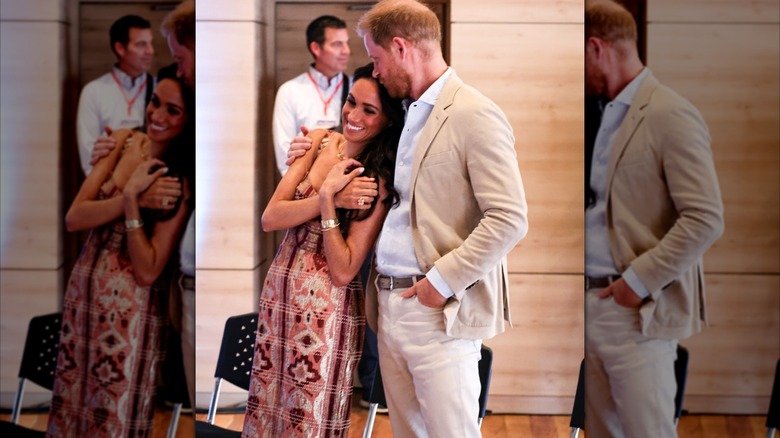 Príncipe Harry le da cariñoso beso en la frente a Meghan Markle en Colombia