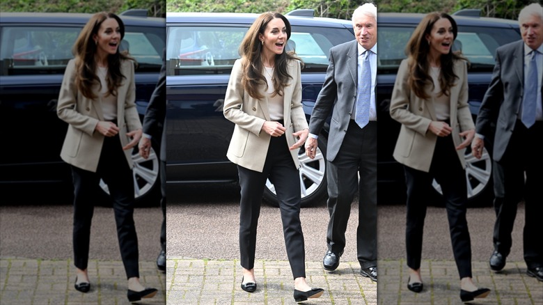 Kate Middleton con blazer color canela y pantalones negros