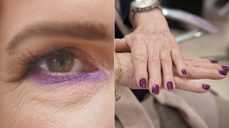 Al lado de un ojo con sombra de ojos morada y manos con esmalte de uñas morado.