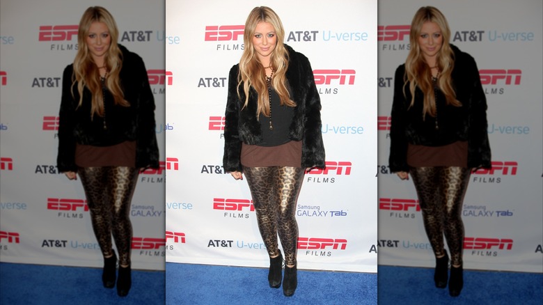 Aubrey O'Day en un evento en 2011 vistiendo unos leggings con estampado animal.