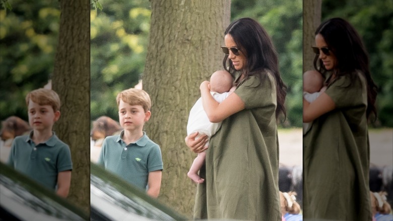 Meghan Markle sostiene al Príncipe Archie mientras usa gafas de sol